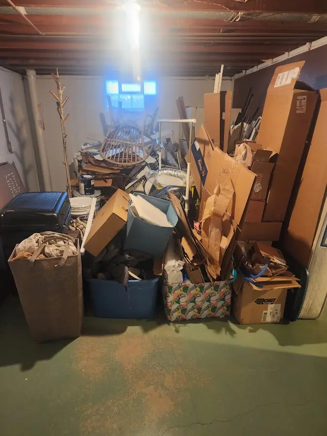 Roll-off dumpster container at job site for Yard Waste Dumpster Rental in Waterloo